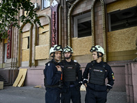 Rescuers are seen outside a residential building after the Russian missile attack in Zaporizhzhia, Ukraine, on June 1, 2024. In Zaporizhzhia...