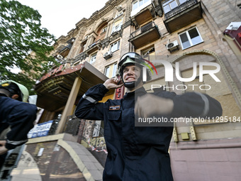 Rescuers are seen outside a residential building after the Russian missile attack in Zaporizhzhia, Ukraine, on June 1, 2024. In Zaporizhzhia...