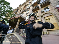 Rescuers are seen outside a residential building after the Russian missile attack in Zaporizhzhia, Ukraine, on June 1, 2024. In Zaporizhzhia...