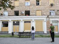 People are staying outside a residential building after the Russian missile attack in Zaporizhzhia, Ukraine, on June 1, 2024. In Zaporizhzhi...