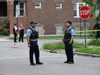 Police officers are gathering at the crime scene for the investigation in Chicago, Illinois, United States, on June 1, 2024. A 40-year-old m...