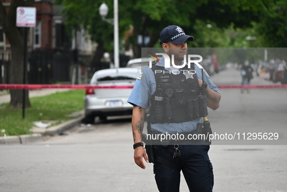 A police officer is guarding the crime scene for the investigation on Saturday morning. A 40-year-old male is in critical condition after be...