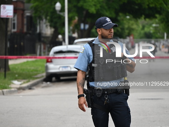 A police officer is guarding the crime scene for the investigation on Saturday morning. A 40-year-old male is in critical condition after be...