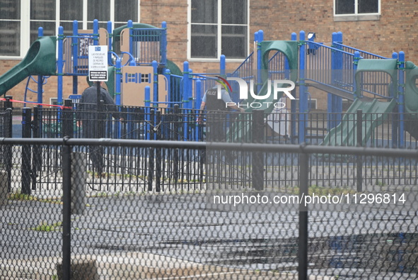 Chicago police are present at the playground where a death investigation is underway in Chicago, Illinois, United States, on June 1, 2024. A...