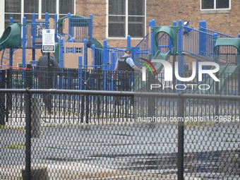 Chicago police are present at the playground where a death investigation is underway in Chicago, Illinois, United States, on June 1, 2024. A...