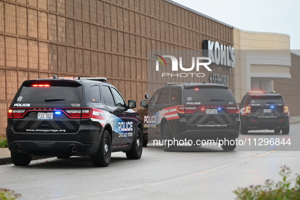 Police vehicles are outside of Chicago Ridge Mall. Heavy police presence is following reports of an unconfirmed shooting at Chicago Ridge Ma...