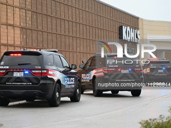 Police vehicles are outside of Chicago Ridge Mall. Heavy police presence is following reports of an unconfirmed shooting at Chicago Ridge Ma...