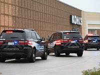 Police vehicles are outside of Chicago Ridge Mall. Heavy police presence is following reports of an unconfirmed shooting at Chicago Ridge Ma...