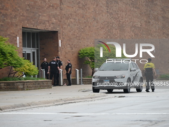 Police vehicles are outside of Chicago Ridge Mall. Heavy police presence is following reports of an unconfirmed shooting at Chicago Ridge Ma...