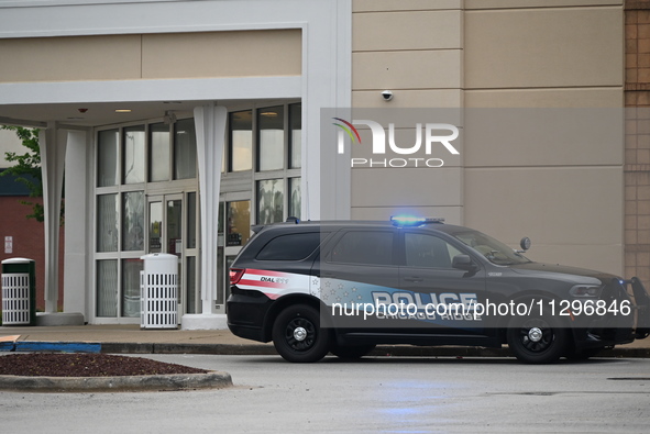 Police vehicles are outside of Chicago Ridge Mall. Heavy police presence is following reports of an unconfirmed shooting at Chicago Ridge Ma...