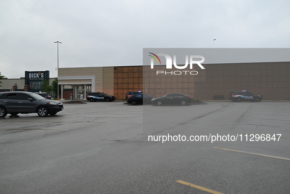 Police vehicles are outside of Chicago Ridge Mall. Heavy police presence is following reports of an unconfirmed shooting at Chicago Ridge Ma...