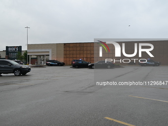 Police vehicles are outside of Chicago Ridge Mall. Heavy police presence is following reports of an unconfirmed shooting at Chicago Ridge Ma...