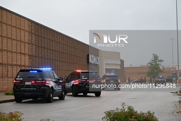 Police vehicles are outside of Chicago Ridge Mall. Heavy police presence is following reports of an unconfirmed shooting at Chicago Ridge Ma...