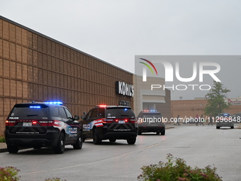 Police vehicles are outside of Chicago Ridge Mall. Heavy police presence is following reports of an unconfirmed shooting at Chicago Ridge Ma...