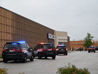 Police vehicles are outside of Chicago Ridge Mall. Heavy police presence is following reports of an unconfirmed shooting at Chicago Ridge Ma...