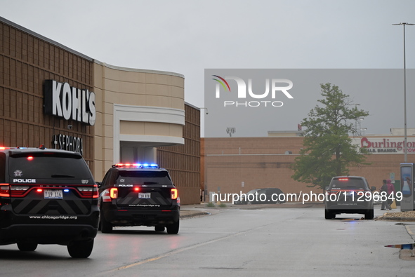 Police vehicles are outside of Chicago Ridge Mall. Heavy police presence is following reports of an unconfirmed shooting at Chicago Ridge Ma...