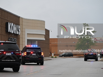 Police vehicles are outside of Chicago Ridge Mall. Heavy police presence is following reports of an unconfirmed shooting at Chicago Ridge Ma...