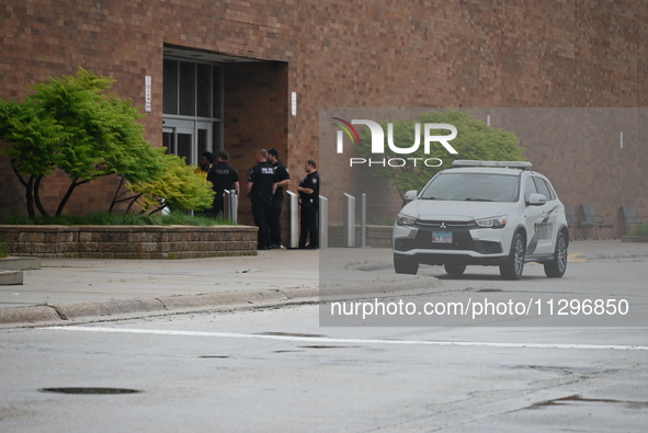 Police vehicles are outside of Chicago Ridge Mall. Heavy police presence is following reports of an unconfirmed shooting at Chicago Ridge Ma...