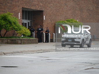 Police vehicles are outside of Chicago Ridge Mall. Heavy police presence is following reports of an unconfirmed shooting at Chicago Ridge Ma...