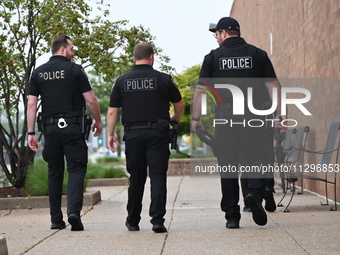 Police officers with heavy weapons are staging at Chicago Ridge Mall. Heavy police presence is following reports of an unconfirmed shooting...