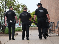 Police officers with heavy weapons are staging at Chicago Ridge Mall. Heavy police presence is following reports of an unconfirmed shooting...