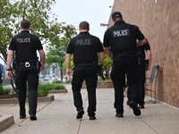 Police officers with heavy weapons are staging at Chicago Ridge Mall. Heavy police presence is following reports of an unconfirmed shooting...