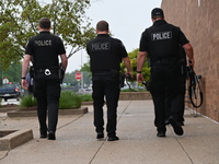 Police officers with heavy weapons are staging at Chicago Ridge Mall. Heavy police presence is following reports of an unconfirmed shooting...