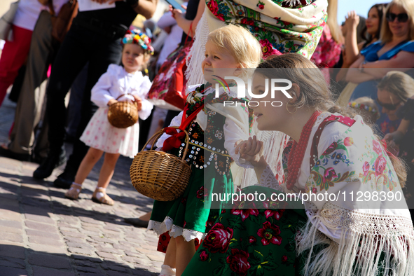 The Corpus Christi procession is walking through the city streets in Krakow, Poland, on May 30, 2024. The Solemnity of the Most Holy Body an...