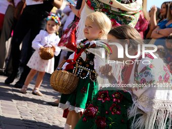 The Corpus Christi procession is walking through the city streets in Krakow, Poland, on May 30, 2024. The Solemnity of the Most Holy Body an...