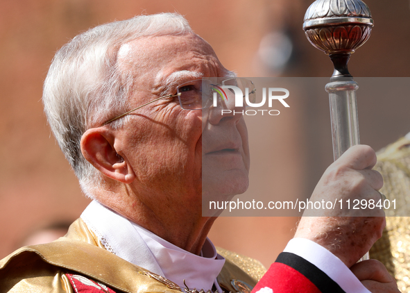 Metropolitan Archbishop of Krakow Marek Jedraszeski is walking during the Corpus Christi procession through the city streets in Krakow, Pola...