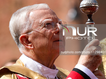 Metropolitan Archbishop of Krakow Marek Jedraszeski is walking during the Corpus Christi procession through the city streets in Krakow, Pola...