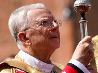 Metropolitan Archbishop of Krakow Marek Jedraszeski is walking during the Corpus Christi procession through the city streets in Krakow, Pola...