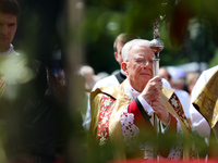 Metropolitan Archbishop of Krakow Marek Jedraszeski is walking during the Corpus Christi procession through the city streets in Krakow, Pola...