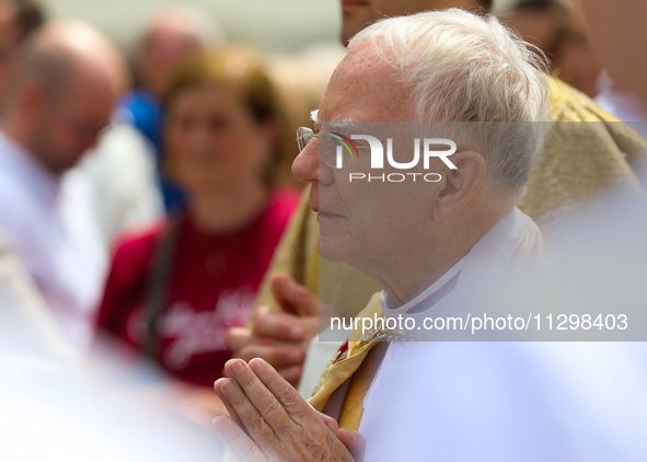 Metropolitan Archbishop of Krakow Marek Jedraszeski is walking during the Corpus Christi procession through the city streets in Krakow, Pola...