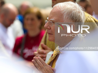 Metropolitan Archbishop of Krakow Marek Jedraszeski is walking during the Corpus Christi procession through the city streets in Krakow, Pola...