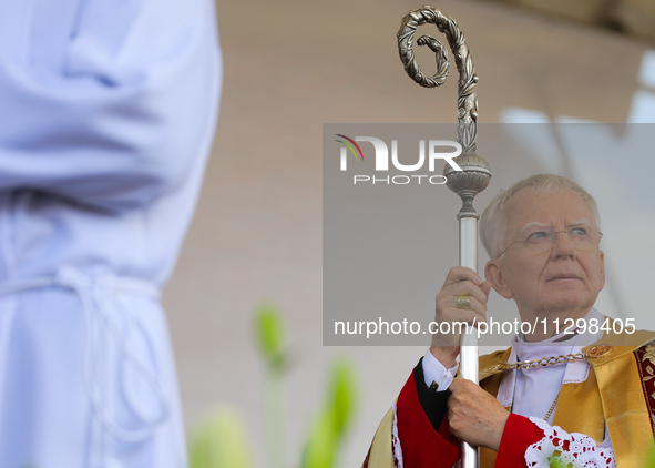 Metropolitan Archbishop of Krakow Marek Jedraszeski is walking during the Corpus Christi procession through the city streets in Krakow, Pola...