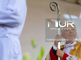 Metropolitan Archbishop of Krakow Marek Jedraszeski is walking during the Corpus Christi procession through the city streets in Krakow, Pola...