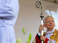 Metropolitan Archbishop of Krakow Marek Jedraszeski is walking during the Corpus Christi procession through the city streets in Krakow, Pola...