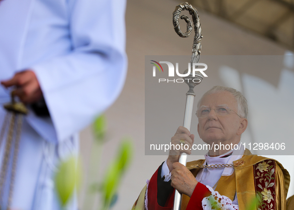 Metropolitan Archbishop of Krakow Marek Jedraszeski is walking during the Corpus Christi procession through the city streets in Krakow, Pola...