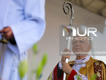 Metropolitan Archbishop of Krakow Marek Jedraszeski is walking during the Corpus Christi procession through the city streets in Krakow, Pola...