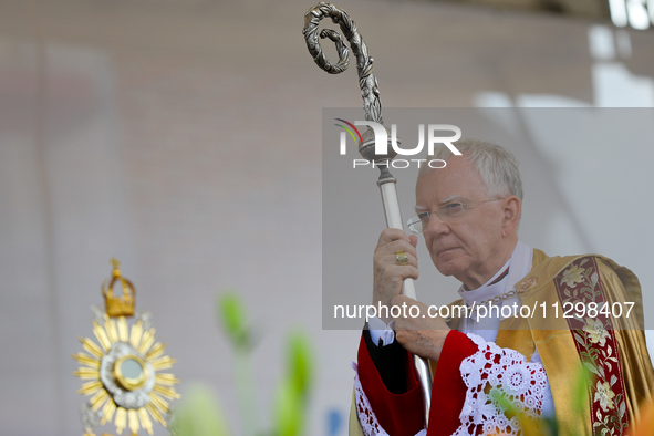 Metropolitan Archbishop of Krakow Marek Jedraszeski is walking during the Corpus Christi procession through the city streets in Krakow, Pola...