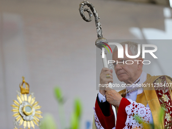 Metropolitan Archbishop of Krakow Marek Jedraszeski is walking during the Corpus Christi procession through the city streets in Krakow, Pola...