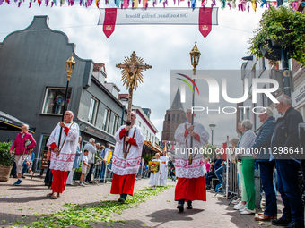 Thousands of people are attending the ''Boxmeerse Vaart,'' an ancient Holy Blood procession, in Boxmeer, Netherlands, on June 2, 2024. (