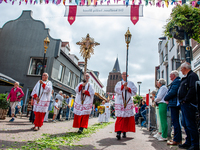 Thousands of people are attending the ''Boxmeerse Vaart,'' an ancient Holy Blood procession, in Boxmeer, Netherlands, on June 2, 2024. (