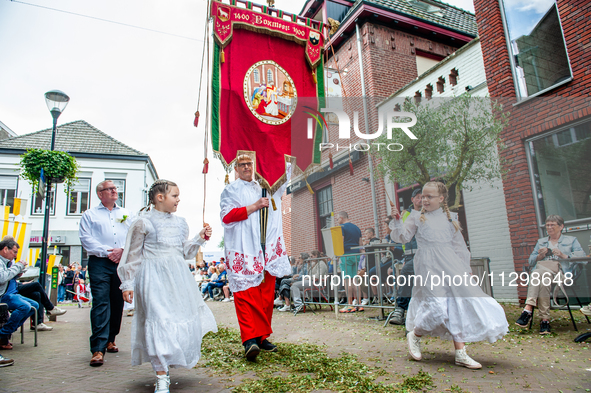 Thousands of people are attending the ''Boxmeerse Vaart,'' an ancient Holy Blood procession, in Boxmeer, Netherlands, on June 2, 2024. 