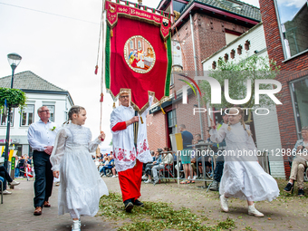 Thousands of people are attending the ''Boxmeerse Vaart,'' an ancient Holy Blood procession, in Boxmeer, Netherlands, on June 2, 2024. (