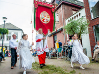 Thousands of people are attending the ''Boxmeerse Vaart,'' an ancient Holy Blood procession, in Boxmeer, Netherlands, on June 2, 2024. (