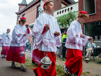 Thousands of people are attending the ''Boxmeerse Vaart,'' an ancient Holy Blood procession, in Boxmeer, Netherlands, on June 2, 2024. (