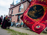 Thousands of people are attending the ''Boxmeerse Vaart,'' an ancient Holy Blood procession, in Boxmeer, Netherlands, on June 2, 2024. (