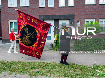 Thousands of people are attending the ''Boxmeerse Vaart,'' an ancient Holy Blood procession, in Boxmeer, Netherlands, on June 2, 2024. (